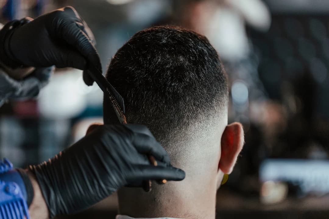 barber-adds-final-touches-to-a-haircut